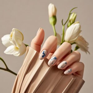 alt Woman showcasing elegant nail art with floral designs and neutral tones highlighting timeless . 5