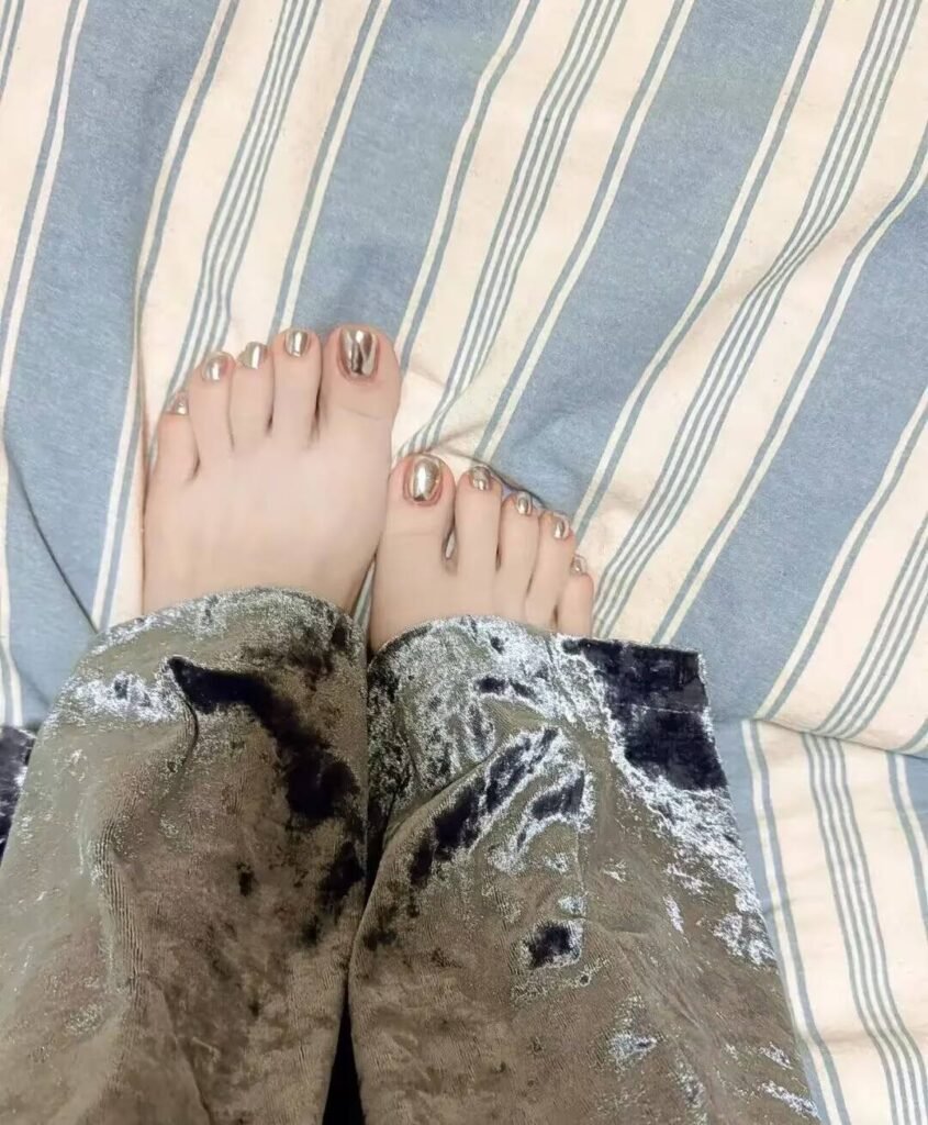 2025 Toenail Trends: Holographic effects, geometric nail art, metallic accents, eco-friendly polish, 3D textures, and LED-lit edges.