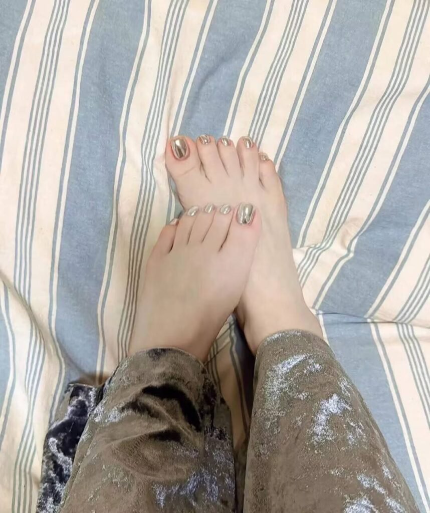 2025 Toenail Trends: Holographic effects, geometric nail art, metallic accents, eco-friendly polish, 3D textures, and LED-lit edges.