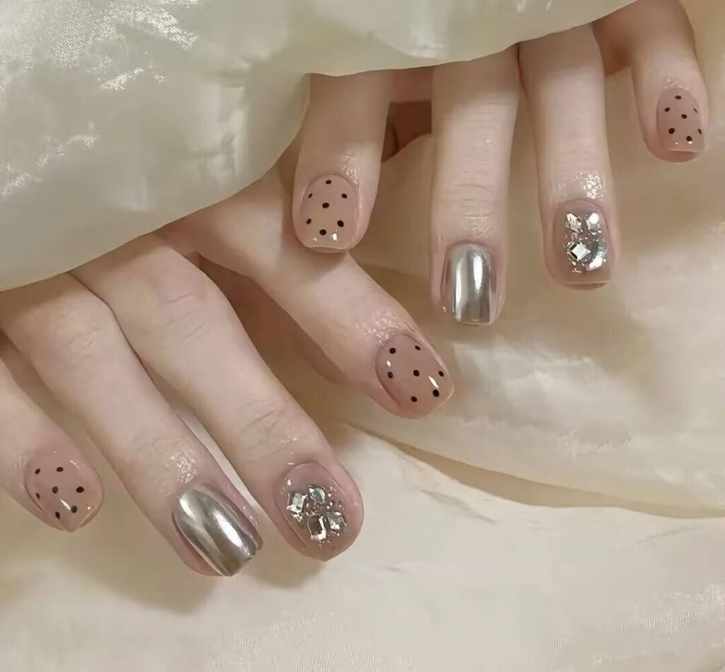 2025 nail trends short nails: Chic Short Nails with Minimalist Art, Neutral Tones & Metallic Accents. Perfect for Effortless Elegance! ✨ #ShortNails #NailTrends2025