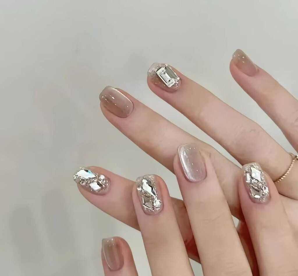 2025 nail trends short nails: Chic Short Nails with Minimalist Art, Neutral Tones & Metallic Accents. Perfect for Effortless Elegance! ✨ #ShortNails #NailTrends2025