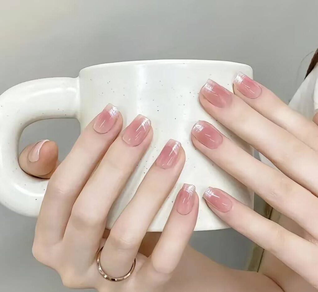 2025 nail trends short nails: Chic Short Nails with Minimalist Art, Neutral Tones & Metallic Accents. Perfect for Effortless Elegance! ✨ #ShortNails #NailTrends2025