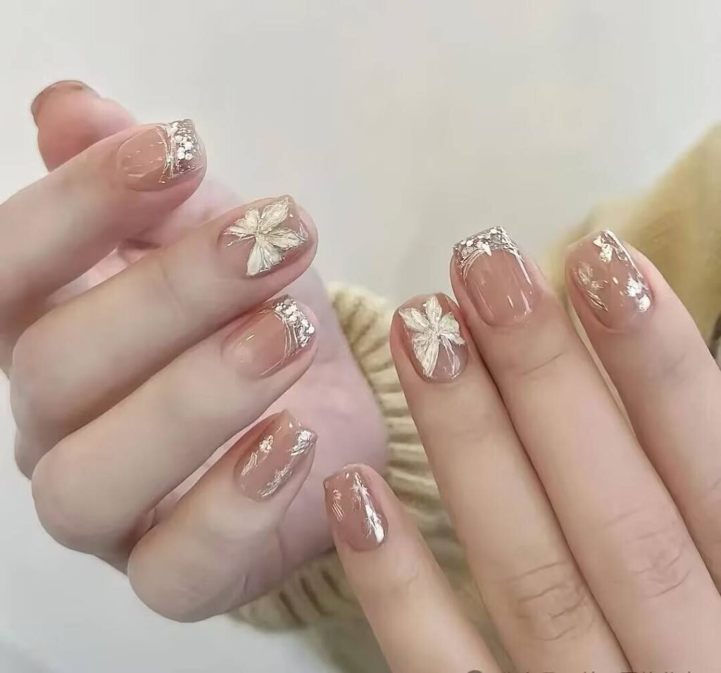 2025 nail trends short nails: Chic Short Nails with Minimalist Art, Neutral Tones & Metallic Accents. Perfect for Effortless Elegance! ✨ #ShortNails #NailTrends2025