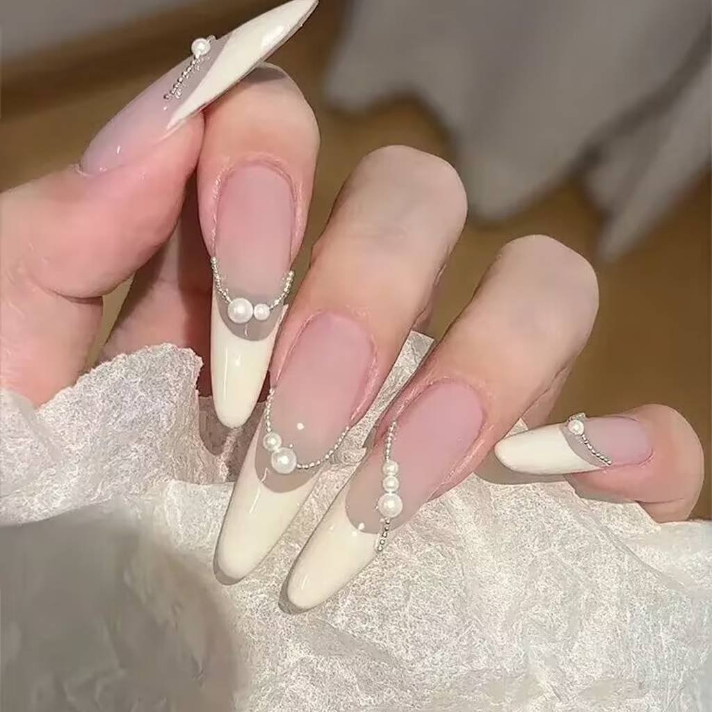 2025 short nails for fair skin: muted blush, pearlized chrome accents + square shapes. Lavender-gray French tips enhance pale complexions with cool undertones.