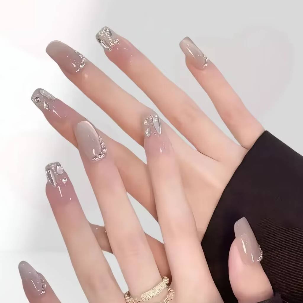 2025 short nails for fair skin: muted blush, pearlized chrome accents + square shapes. Lavender-gray French tips enhance pale complexions with cool undertones.