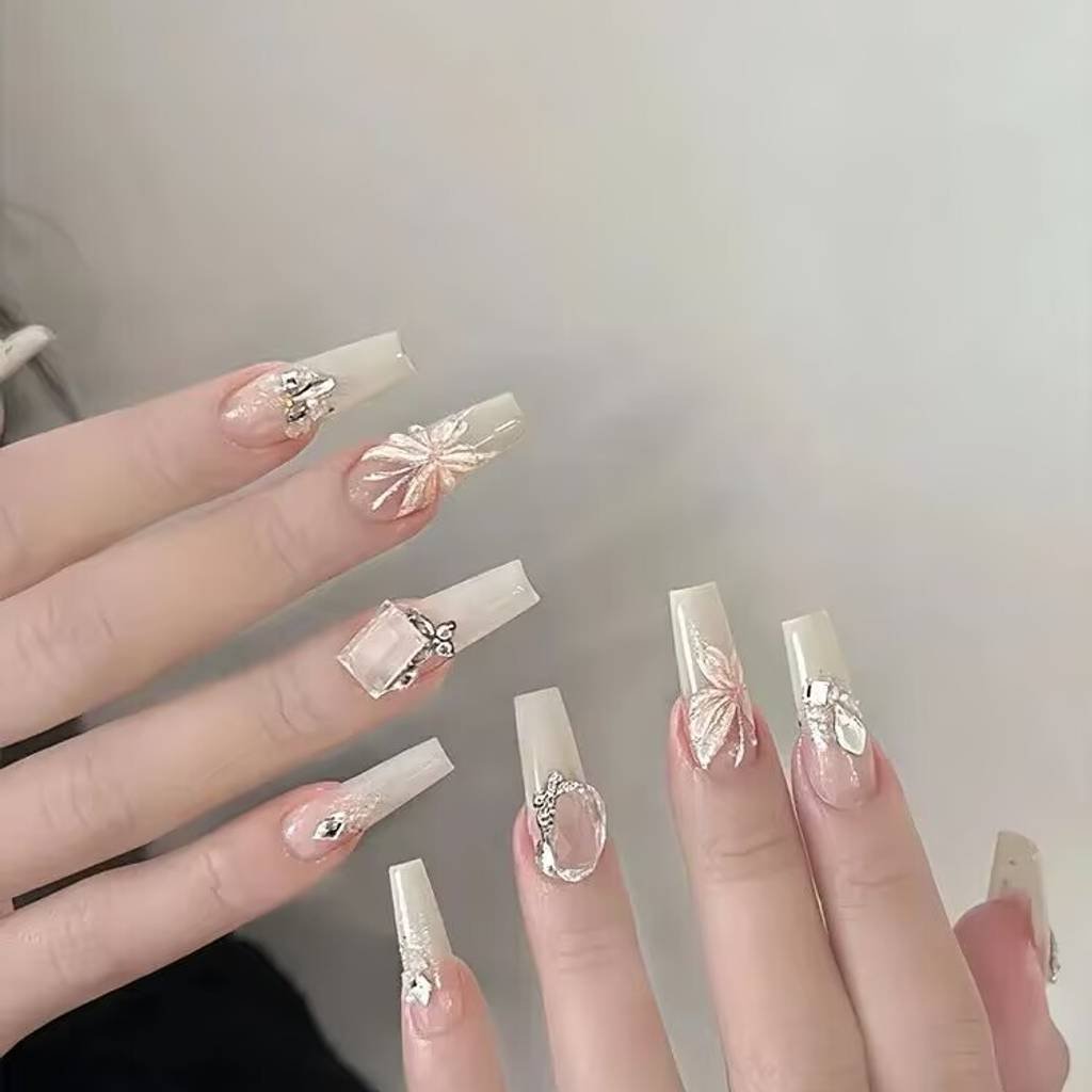 2025 short nails for fair skin: muted blush, pearlized chrome accents + square shapes. Lavender-gray French tips enhance pale complexions with cool undertones.