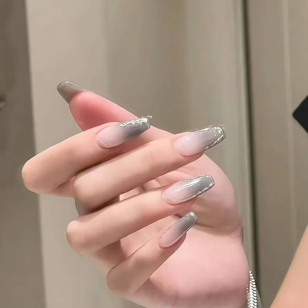 2025 short nails for fair skin: muted blush, pearlized chrome accents + square shapes. Lavender-gray French tips enhance pale complexions with cool undertones.