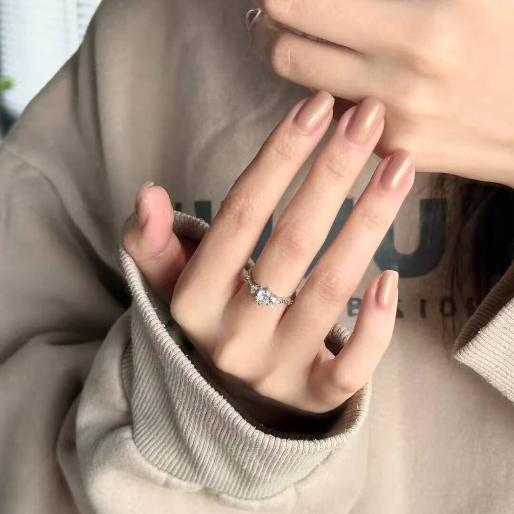 2025 short nails for fair skin: muted blush, pearlized chrome accents + square shapes. Lavender-gray French tips enhance pale complexions with cool undertones.