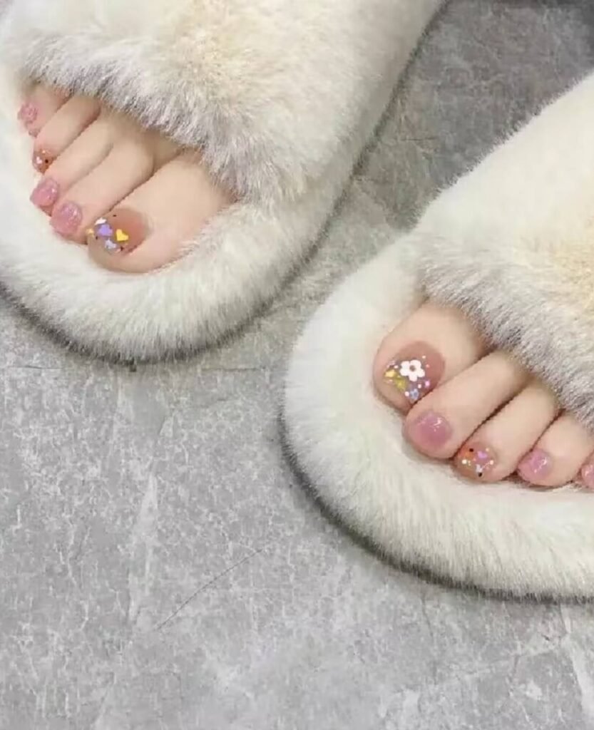 "2025 short toenail trends: minimalist geometric designs in earth tones with chrome accents, Korean-inspired negative space, low-maintenance styles."