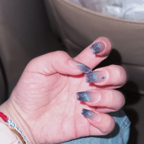 Dreamy Nail Designs 2025: Office-Approved & Hand-Whitening Styles from Seoul to NYC 6 "Dreamy Nail Designs 2025: pearlescent lavender nails with gold foil and minimalist line art, inspired by Seoul trends"