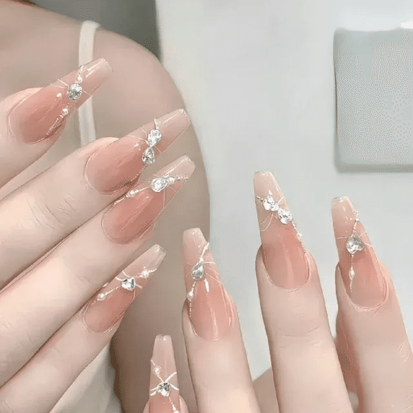 Dreamy Nail Designs 2025: Office-Approved & Hand-Whitening Styles from Seoul to NYC 15 "Dreamy Nail Designs 2025: pearlescent lavender nails with gold foil and minimalist line art, inspired by Seoul trends"