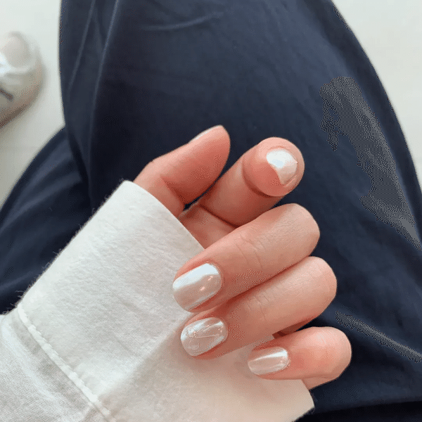 Dreamy Nail Designs 2025: Office-Approved & Hand-Whitening Styles from Seoul to NYC 9 "Dreamy Nail Designs 2025: pearlescent lavender nails with gold foil and minimalist line art, inspired by Seoul trends"