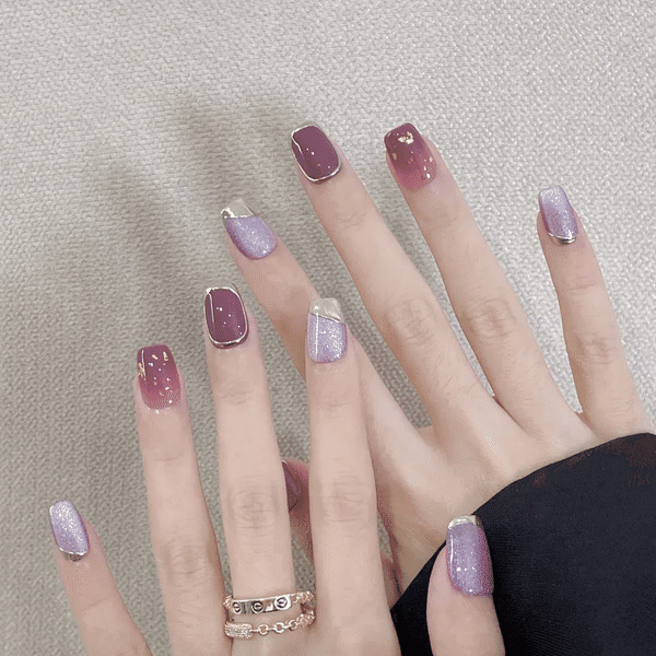 Dreamy Nail Designs 2025: Office-Approved & Hand-Whitening Styles from Seoul to NYC 11 "Dreamy Nail Designs 2025: pearlescent lavender nails with gold foil and minimalist line art, inspired by Seoul trends"