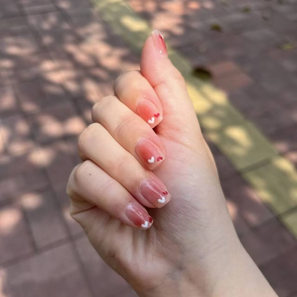 Summer nail trends for fair skin:Lemonade nail art with glitter accent - closeup