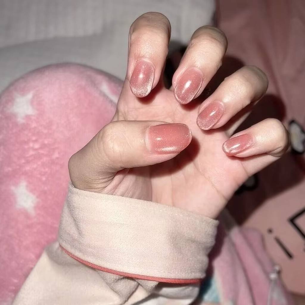 Summer nail trends for fair skin:Misty blue cat eye nails indoor lighting effect