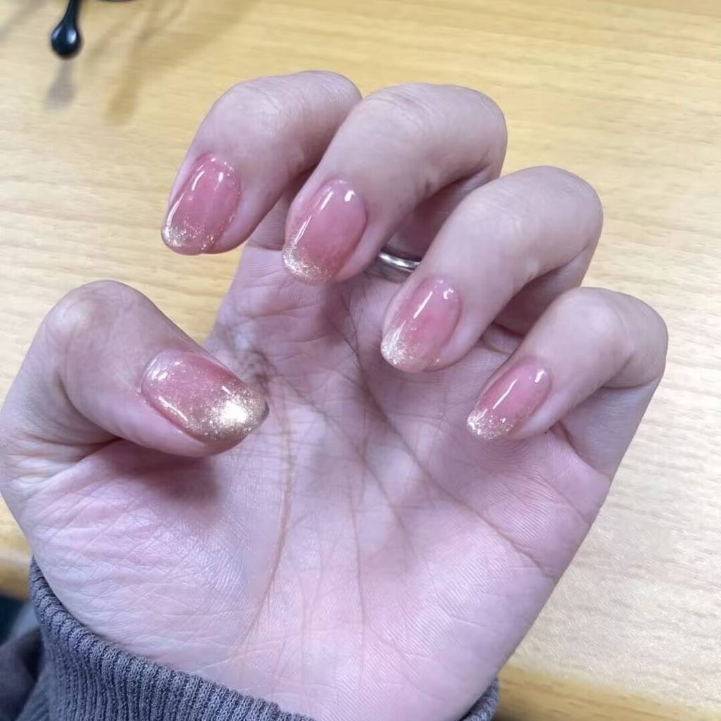 Summer nail trends for fair skin:Lemonade nail art with glitter accent - closeup