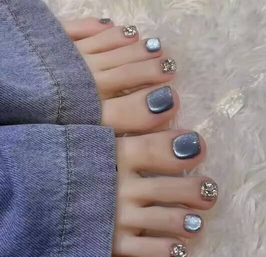 Summer pedicure ideas："Orange-yellow pedicure with coconut pattern for summer sandals"
