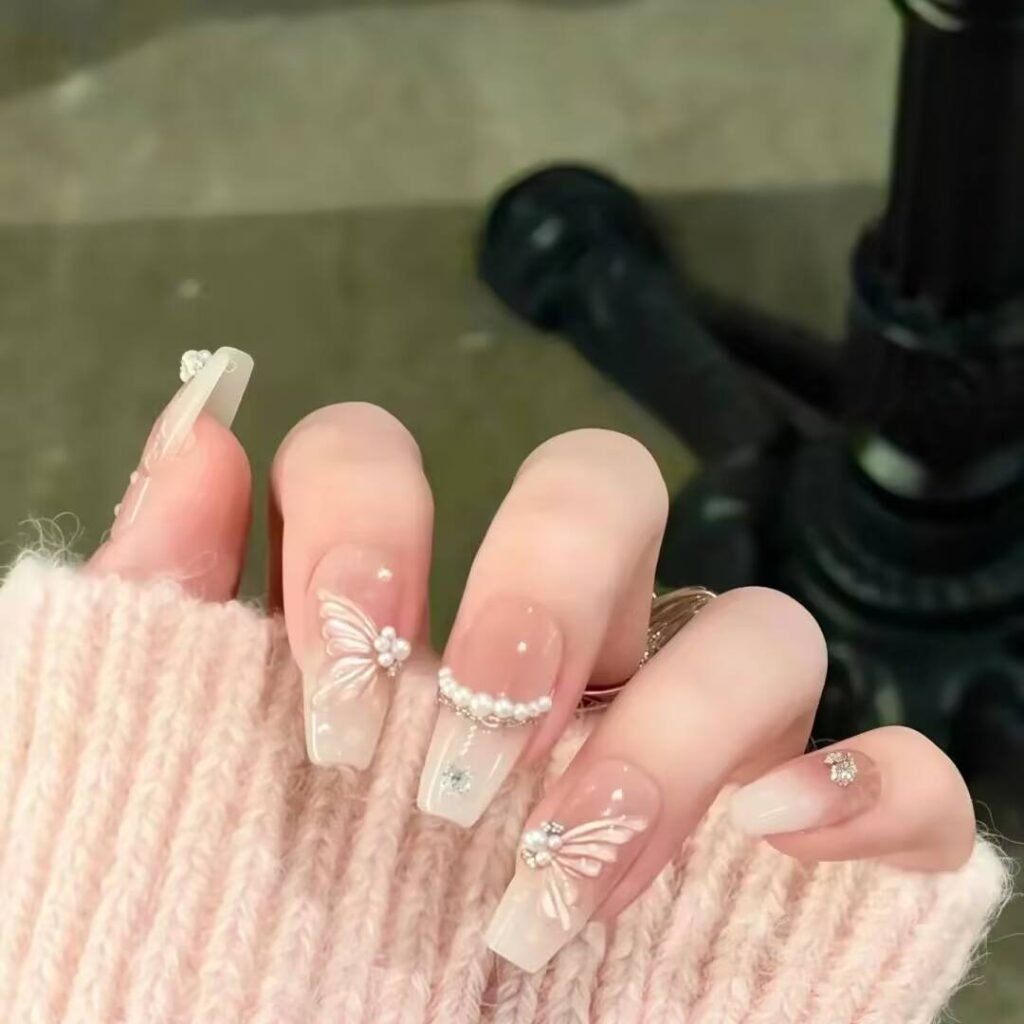 "Icy translucent nails with delicate shimmer, showcasing the latest ice translucent nail trends in glossy, frosty elegance."