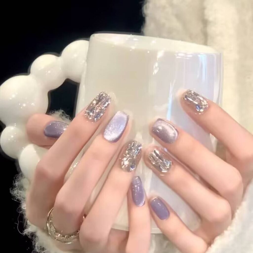 "Icy translucent nails with delicate shimmer, showcasing the latest ice translucent nail trends in glossy, frosty elegance."