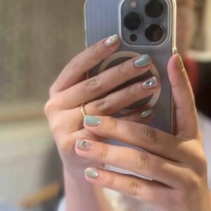 "Icy translucent nails with delicate shimmer, showcasing the latest ice translucent nail trends in glossy, frosty elegance."