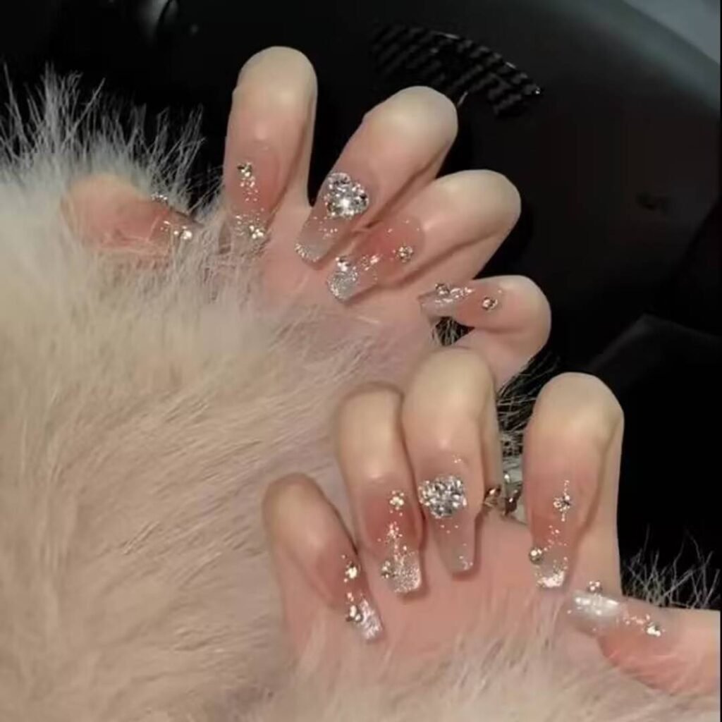 "Icy translucent nails with delicate shimmer, showcasing the latest ice translucent nail trends in glossy, frosty elegance."