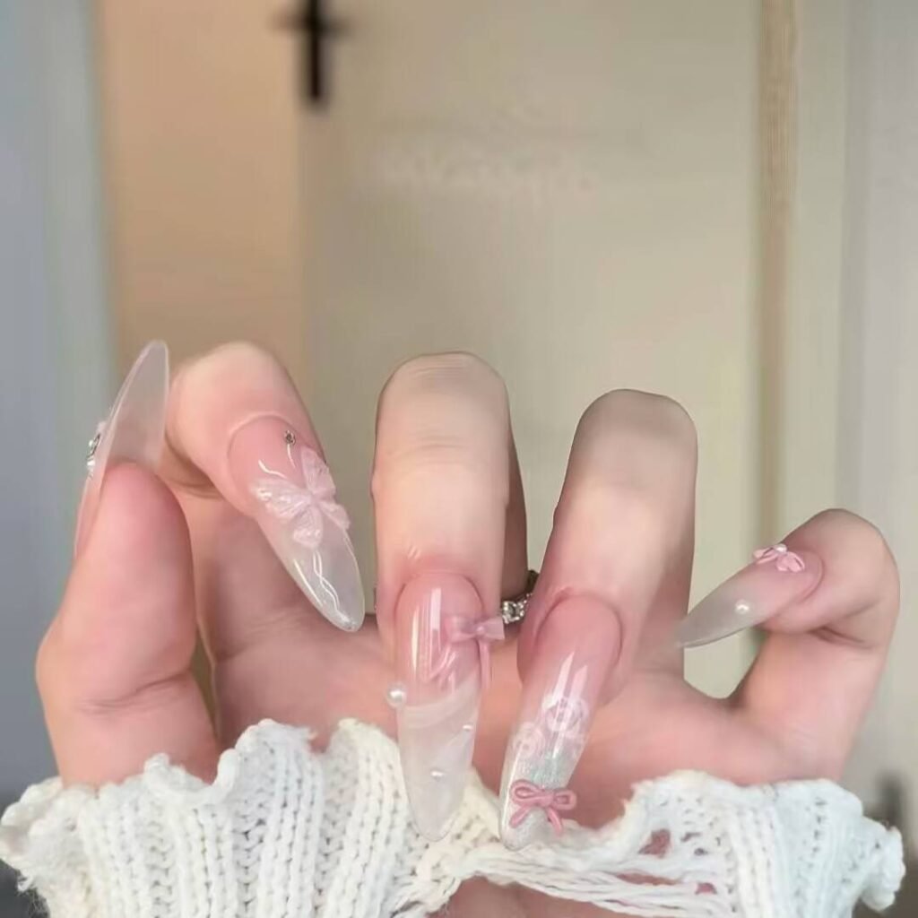 "Icy translucent nails with delicate shimmer, showcasing the latest ice translucent nail trends in glossy, frosty elegance."