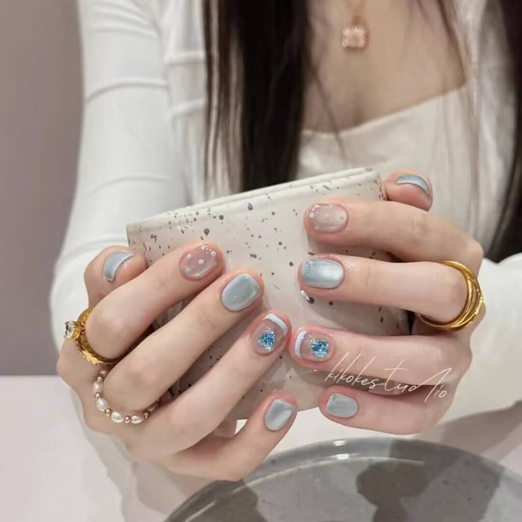 "Icy translucent nails with delicate shimmer, showcasing the latest ice translucent nail trends in glossy, frosty elegance."
