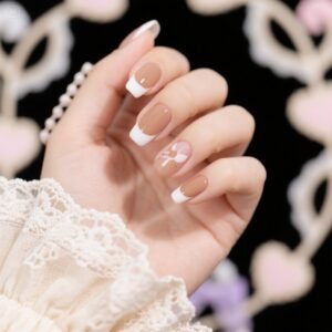 "Soft mist milk tea French nails with rounded edges for a delicate look"