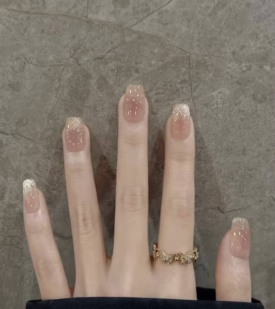 Alt: AI-Powered Nail Style Finder app interface suggesting personalized manicure designs.