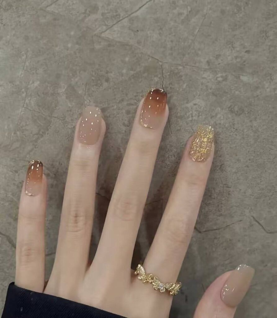 Alt: AI-Powered Nail Style Finder app interface suggesting personalized manicure designs.
