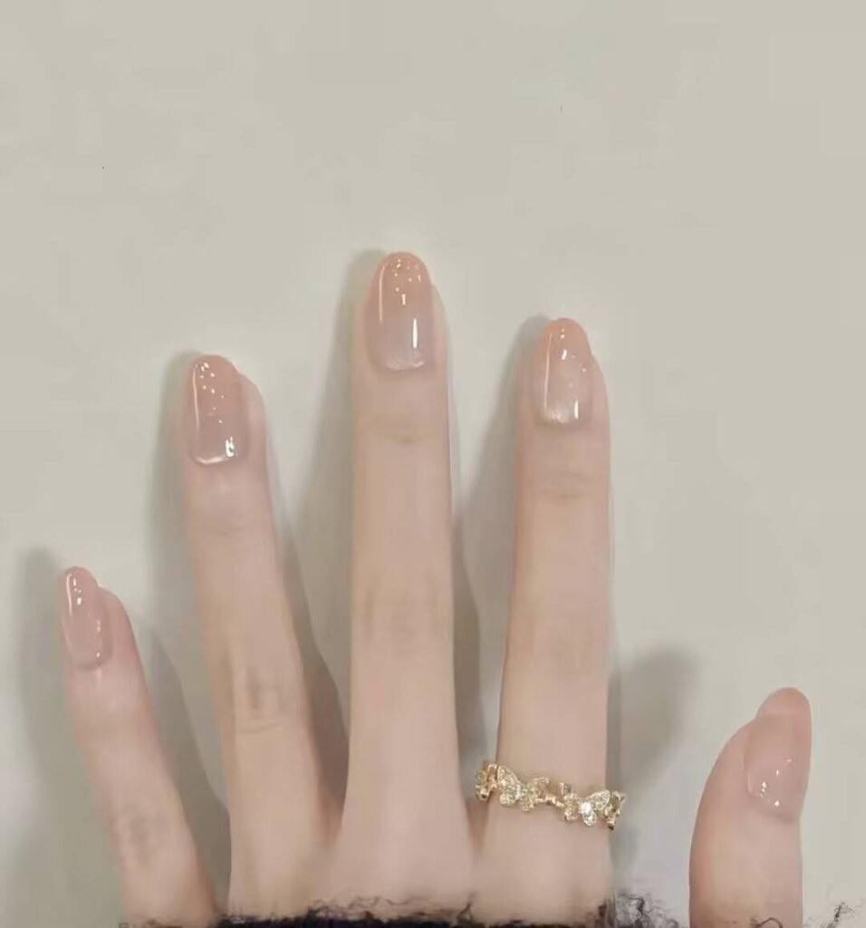 Alt: AI-Powered Nail Style Finder app interface suggesting personalized manicure designs.