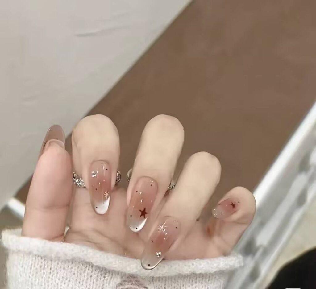 Alt: AI-Powered Nail Style Finder app interface suggesting personalized manicure designs.
