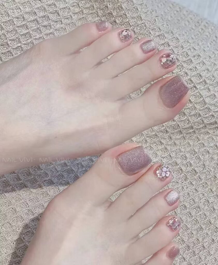 Ankle-flattering pedicures:Cream Shell White Pedicure with minimalist pearl finish - clean toe nail aesthetic