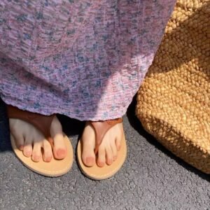 INS inspired toe nail art：Holographic French pedicure on tan feet at beach