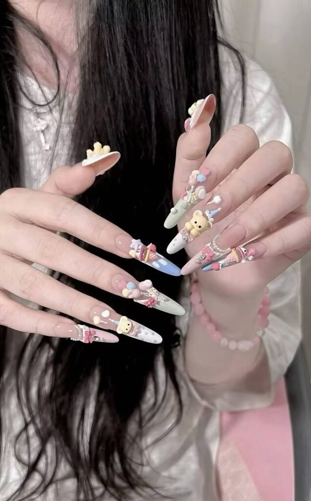 jellyfish blue glazed nails with silver foil accents - Timi Nail Studio