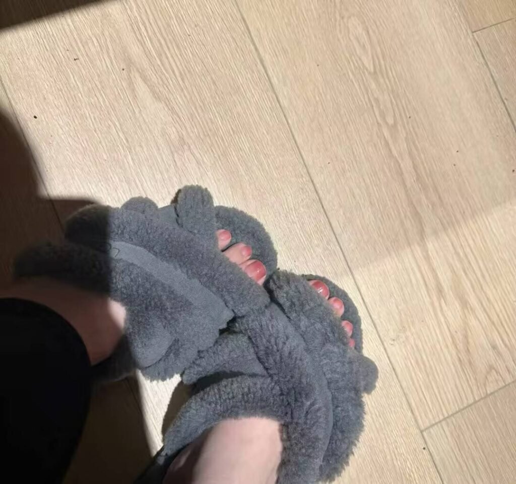 Cozy and luxurious winter pedicure styles 2025 with rich jewel tones and frosty metallic details.