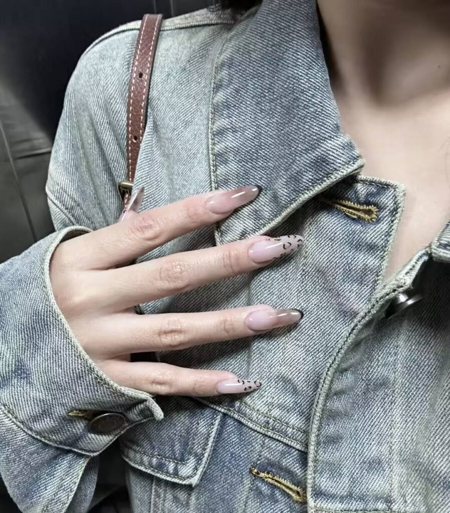 Swatches of flattering nail colors for fair skin: pale pink, peach nude, mauve, and sheer red