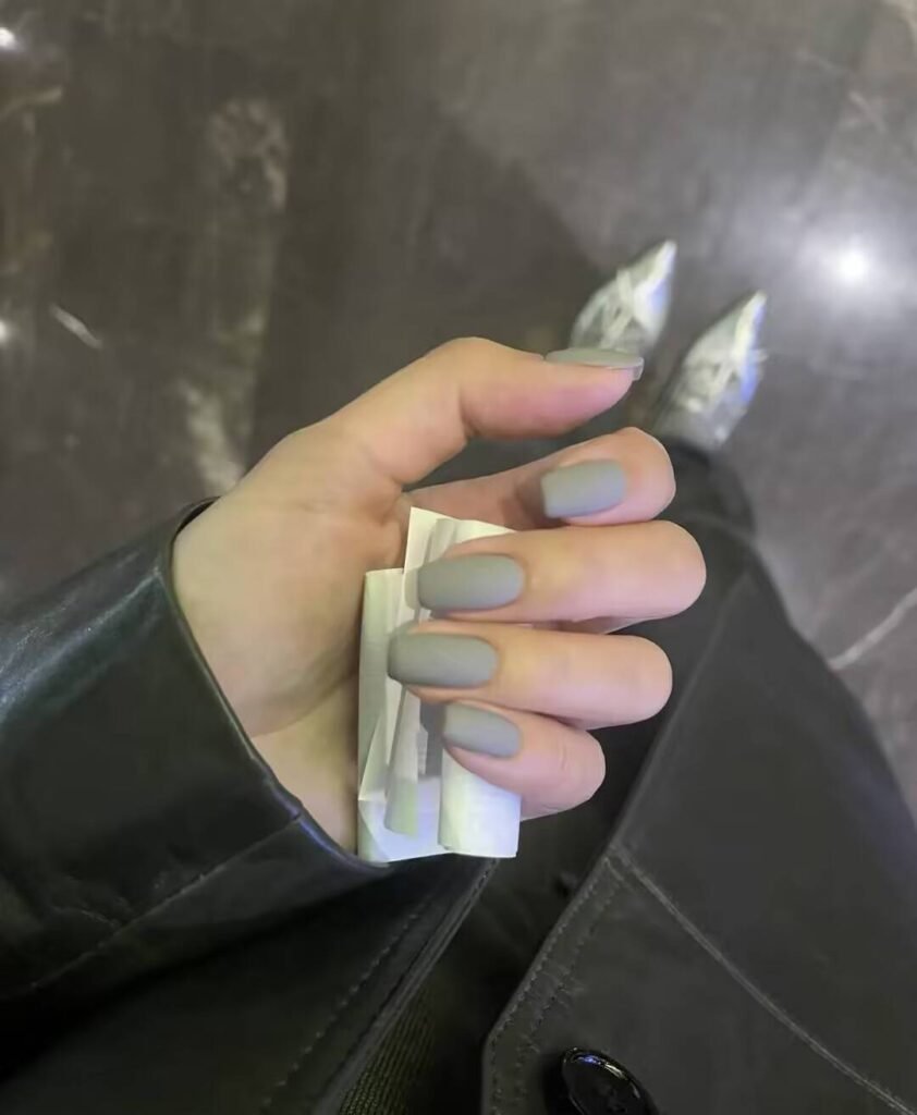 Swatches of flattering nail colors for fair skin: pale pink, peach nude, mauve, and sheer red