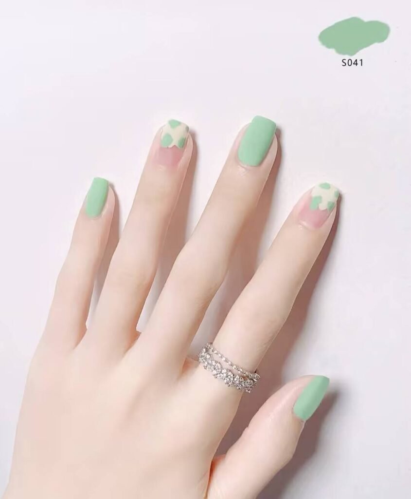 Swatches of flattering nail colors for fair skin: pale pink, peach nude, mauve, and sheer red