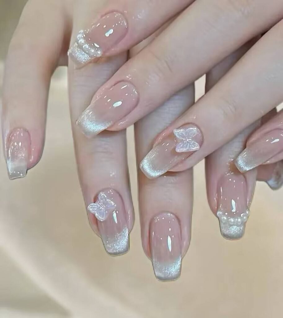 Swatches of flattering nail colors for fair skin: pale pink, peach nude, mauve, and sheer red