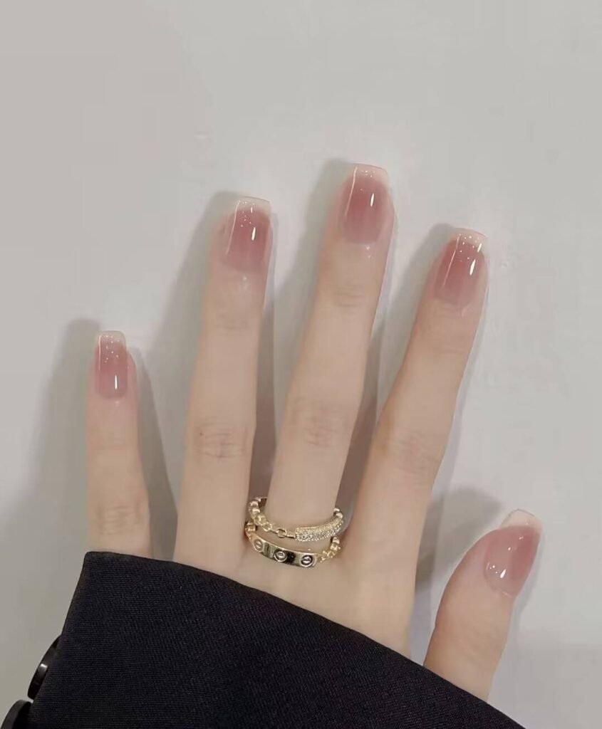 Swatches of flattering nail colors for fair skin: pale pink, peach nude, mauve, and sheer red