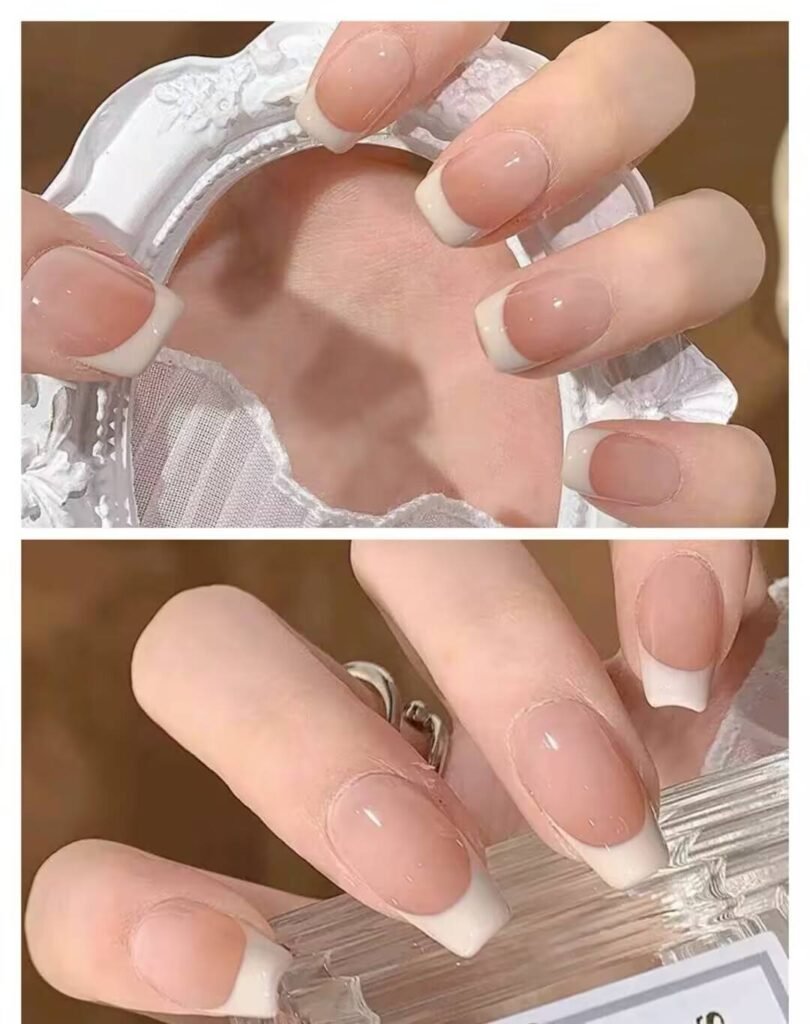 Short, elegant nail designs featuring minimalist styles like French tips, soft nude polish, and delicate gold accents on natural nails.