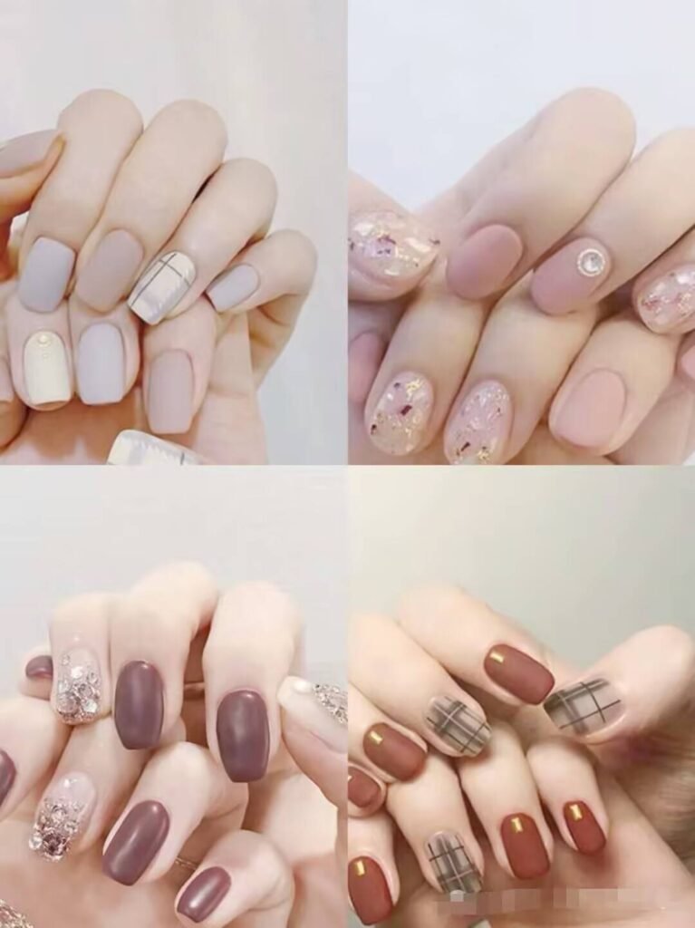 Short, elegant nail designs featuring minimalist styles like French tips, soft nude polish, and delicate gold accents on natural nails.