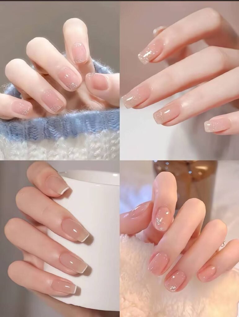 Minimalist spring nail 2025 trends: sheer blush base with subtle chrome half-moon accents.