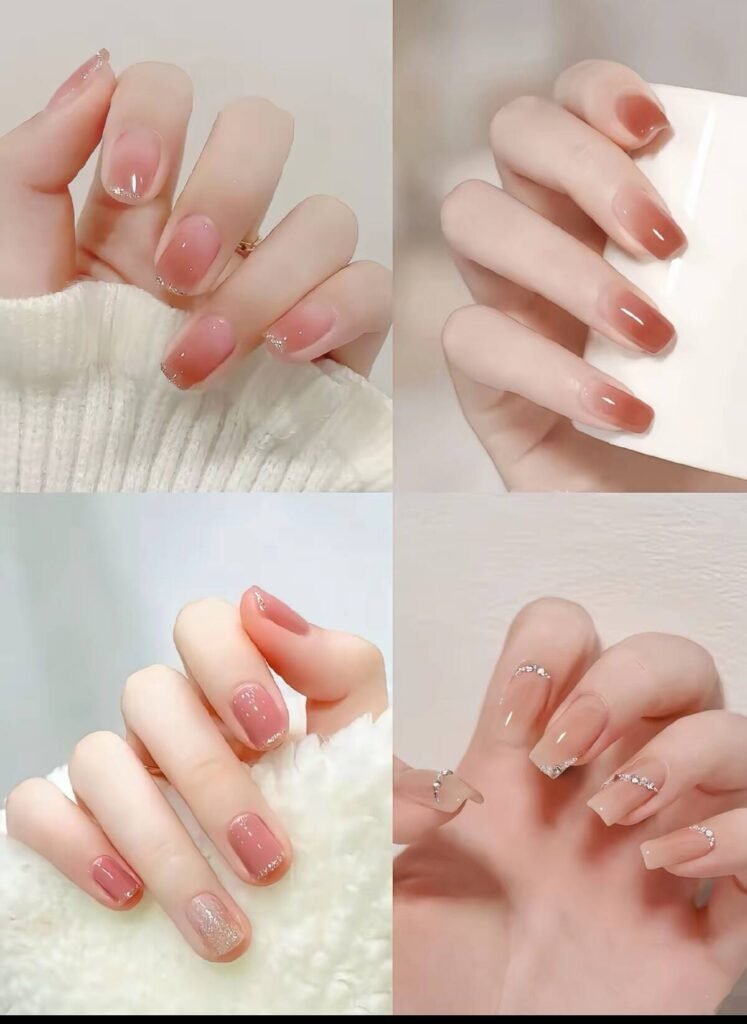 Minimalist spring nail 2025 trends: sheer blush base with subtle chrome half-moon accents.