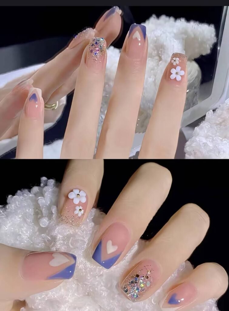 Minimalist spring nail 2025 trends: sheer blush base with subtle chrome half-moon accents.