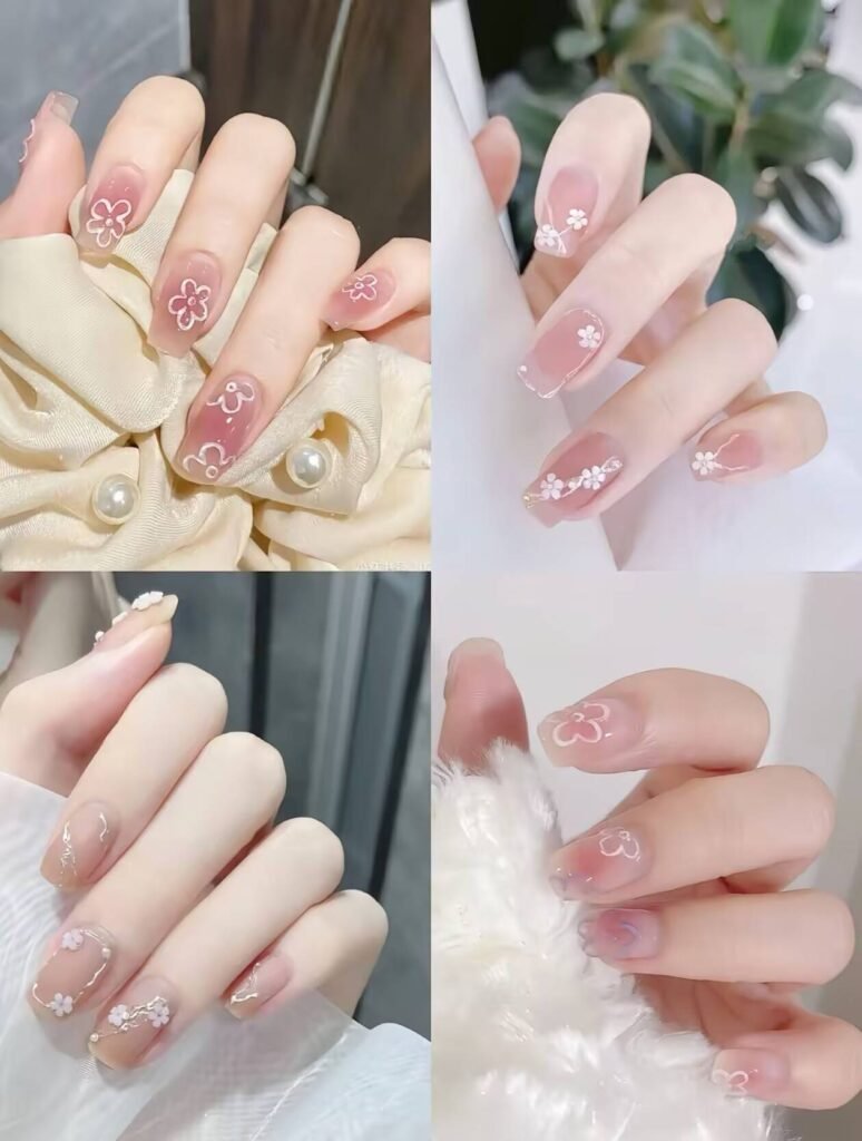 Minimalist spring nail 2025 trends: sheer blush base with subtle chrome half-moon accents.