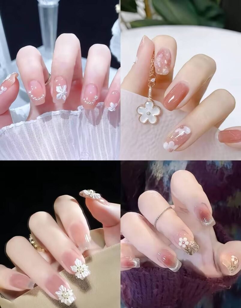 Minimalist spring nail 2025 trends: sheer blush base with subtle chrome half-moon accents.