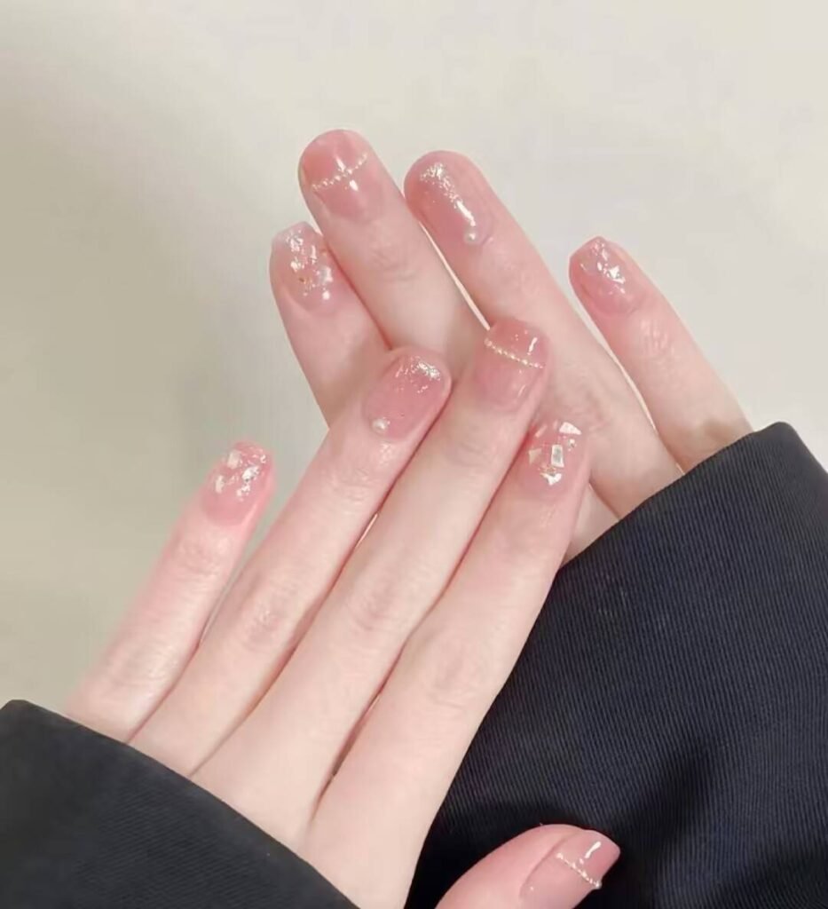 "Ultimate Nail Style Guide: showcase of trendy nail art designs including ombre, glitter, and minimalist styles on diverse hand models"