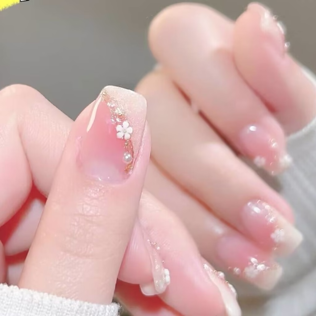 Short minimalist nails guide: Step-by-step application of a clean nude polish.